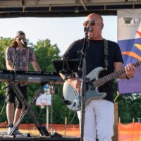 guitarist and keyboard player on stage at Riverview Summerfest