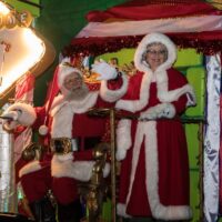 Santa and Mrs. Claus on float during parade at Royal Oak Jingle
