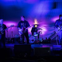 four member band on stage at Wyandotte's Winter Beer Cocktail Fest