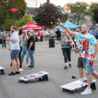 people playing cornhole during Wyandotte's Beer Fest