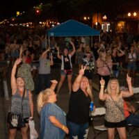 crowd dancing during Wyandotte's Wine Crawl